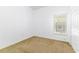 Well-lit bedroom with window and closet, a serene and functional space at 2660 Hemingway Ave, Haines City, FL 33844