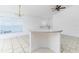 Bright and airy kitchen area with sleek countertops, offering great space for cooking and casual dining at 2660 Hemingway Ave, Haines City, FL 33844