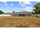 Expansive backyard with a white fence provides plenty of space for outdoor activities at 2812 Hickory Ridge Dr, Lakeland, FL 33813