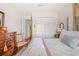 Comfortable bedroom with classic furniture, a decorative rug and soft, neutral tones at 2965 Mission Lakes Dr, Lakeland, FL 33803