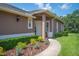 Inviting home exterior features a nicely landscaped walkway leading to the front door at 2965 Mission Lakes Dr, Lakeland, FL 33803