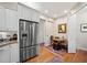 Kitchen area with stainless steel refrigerator and breakfast nook at 2965 Mission Lakes Dr, Lakeland, FL 33803