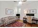 Cozy home office with a comfortable sofa, desk, and ample natural light at 2965 Mission Lakes Dr, Lakeland, FL 33803