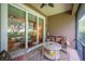 Relaxing screened patio with comfortable seating and views of the lush landscape at 2965 Mission Lakes Dr, Lakeland, FL 33803