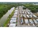 An aerial perspective showcasing the community's layout with homes near the serene river at 3027 Mimosa Way, Lakeland, FL 33801