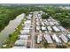 An aerial view of the community, highlighting the homes along the waterfront at 3027 Mimosa Way, Lakeland, FL 33801