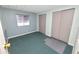A quaint bedroom features two large closets at 3027 Mimosa Way, Lakeland, FL 33801