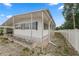 Exterior elevation of home with covered awning at 3027 Mimosa Way, Lakeland, FL 33801
