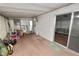 This sun room features sliding glass doors at 3027 Mimosa Way, Lakeland, FL 33801