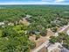 Extensive aerial view highlighting the vast woodlands and neighborhood surrounding the property at 3441 Sherertz Rd, Lakeland, FL 33810
