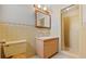 Classic bathroom featuring a vanity, toilet, and shower at 3441 Sherertz Rd, Lakeland, FL 33810