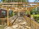 Open deck with seating area, wooden awning, and railings at 3441 Sherertz Rd, Lakeland, FL 33810
