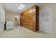 Laundry room with washer, dryer, and built-in storage cabinets at 3441 Sherertz Rd, Lakeland, FL 33810