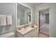Well-lit bathroom featuring a vanity with sink and a mirror, providing a functional space at 346 Tanager Ct, Lakeland, FL 33803