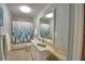 Bathroom featuring a bathtub with a shower curtain, vanity with countertop space, and tiled flooring at 346 Tanager Ct, Lakeland, FL 33803