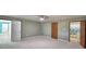 Open and bright bedroom featuring an ensuite bathroom and a closet, offering convenience and ample storage at 346 Tanager Ct, Lakeland, FL 33803