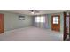 Spacious bedroom with a ceiling fan, a picture hanging on the wall, and a window with sheer curtains at 346 Tanager Ct, Lakeland, FL 33803