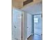 Hallway showcasing tile and multiple doors at 346 Tanager Ct, Lakeland, FL 33803