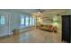 Cozy living room featuring hardwood floors, stylish furnishings, and ample natural light at 346 Tanager Ct, Lakeland, FL 33803