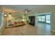 Cozy living room featuring hardwood floors, stylish furnishings, and ample natural light at 346 Tanager Ct, Lakeland, FL 33803
