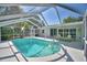 Sparkling screened pool area with patio space, offering a private and relaxing backyard retreat at 346 Tanager Ct, Lakeland, FL 33803