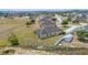 This aerial view shows an expansive backyard, privacy fence, and enclosed back porch at 3560 Spring Creek Rd, Dundee, FL 33838