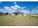 This house features an expansive backyard with a screened in porch to enjoy outdoor living at 3560 Spring Creek Rd, Dundee, FL 33838