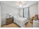 Cozy bedroom features a ceiling fan and large window providing great natural light at 3560 Spring Creek Rd, Dundee, FL 33838