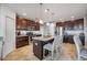 Stylish kitchen featuring stainless steel appliances, an island with seating, and abundant cabinet space at 3560 Spring Creek Rd, Dundee, FL 33838