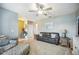 Spacious living room featuring tile and carpet flooring with contemporary décor and natural light at 3560 Spring Creek Rd, Dundee, FL 33838