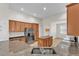 Open eat-in kitchen with stainless steel appliances and granite countertops at 3592 Prescott Loop, Lakeland, FL 33810