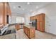 Spacious kitchen with stainless steel appliances and granite countertops at 3592 Prescott Loop, Lakeland, FL 33810