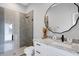 Bathroom featuring a white vanity with a granite countertop and a walk-in shower at 3664 Frentress Dr, Lakeland, FL 33812