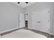 Bedroom featuring wood floors, neutral walls, and a closet at 3664 Frentress Dr, Lakeland, FL 33812