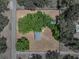 Birds-eye view of a home with a large lot and mature trees shading the property at 3705 Garland St, Mulberry, FL 33860