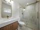 Modern bathroom with a stand-up shower and gold hardware, boasting contemporary fixtures and elegant design at 3705 Garland St, Mulberry, FL 33860
