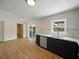 Modern kitchen features stainless steel appliances, dark blue cabinets, and an open floor plan at 3705 Garland St, Mulberry, FL 33860