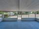 Wide angle view of a covered screened lanai with concrete floor at 3705 Garland St, Mulberry, FL 33860
