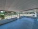 Spacious screened-in lanai, offering an outdoor living space with a view of the backyard at 3705 Garland St, Mulberry, FL 33860