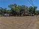 View of the property highlighting large trees and open space, perfect for outdoor activities at 3705 Garland St, Mulberry, FL 33860