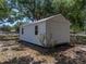 White shed with new metal roof and plenty of room for storage at 3705 Garland St, Mulberry, FL 33860