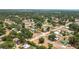Aerial view of a home showing its location in a tree-filled neighborhood at 400 6Th Ne St, Fort Meade, FL 33841