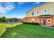 This townhome features a lush backyard that backs up to a serene lake, providing privacy at 4078 Winding Vine Dr, Lakeland, FL 33812