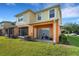 View of the backyard featuring a lawn, screened in porch and open patio area at 4078 Winding Vine Dr, Lakeland, FL 33812