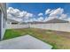 Large backyard with a white vinyl fence, and patio area at 4203 San Rocco Way, Winter Haven, FL 33884