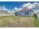 Enjoy this fully fenced backyard, complete with a screened-in lanai, and concrete patio at 4203 San Rocco Way, Winter Haven, FL 33884