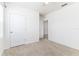 Bedroom featuring neutral carpet, ample natural light, and easy access to the closet at 4203 San Rocco Way, Winter Haven, FL 33884