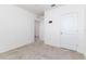 Neutral bedroom with carpet, TV mount, and open closet provides a serene and comfortable space at 4203 San Rocco Way, Winter Haven, FL 33884