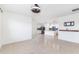Spacious open floorplan showcases a seamless connection between the kitchen, dining, and living areas at 4203 San Rocco Way, Winter Haven, FL 33884