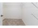 Spacious walk-in closet with ample shelving for easy organization and storage at 4203 San Rocco Way, Winter Haven, FL 33884